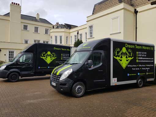 Removal trucks outside period mansion